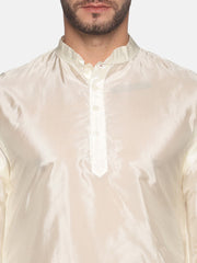 Men Cream Colour Art Silk Kurta Pyjama Set.