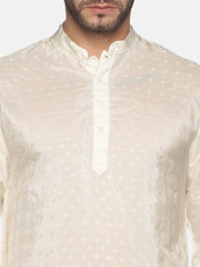 Men Cream Colour Art Silk Kurta Pyjama Set.